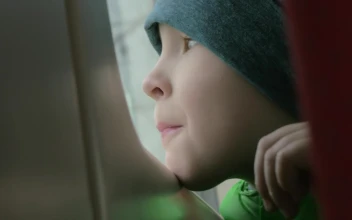 Stock Video Boy Looking Out Of A Tram Window For PC