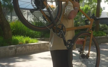 Stock Video Boy Loading His Bike In A Park For PC