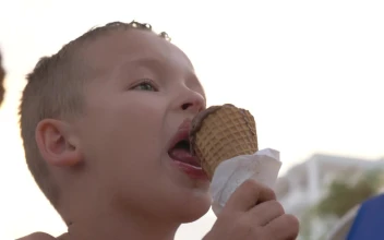 Stock Video Boy Enjoying A Chocolate Ice Cream For PC