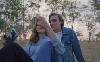 Stock Video Boy And Girl Taking Photos In Nature For PC