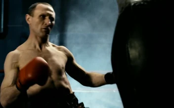Stock Video Boxer Training Hard With The Punch Bag For PC