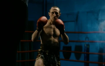 Stock Video Boxer Training Hard With Punching Bag For PC