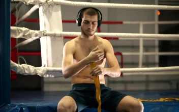 Stock Video Boxer Preparing For His Training Next To The Ring For PC