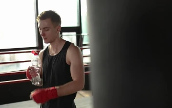 Stock Video Boxer Drinking Water After His Training For PC