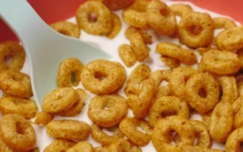 Stock Video Bowl With Cereal And Milk Rotating Slowly For PC