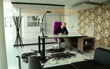 Stock Video Boss Sitting At Their Desk For PC