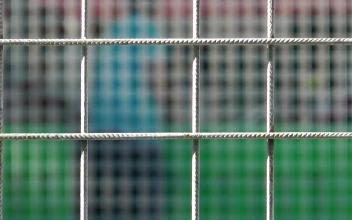 Stock Video Bored Or Tired Man Behind A Fence For PC