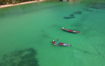 Stock Video Boats On A Tropical Beach Paradise For PC