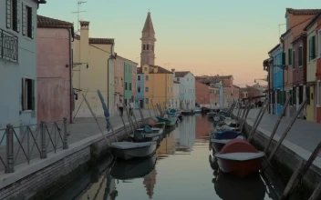 Stock Video Boats Lining A River In Italy For PC