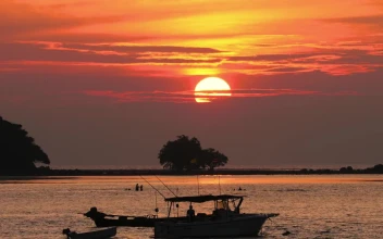 Stock Video Boats In The Ocean At Dusk For PC