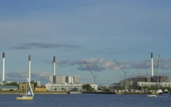 Stock Video Boats Heading Past An Industrial Port For PC