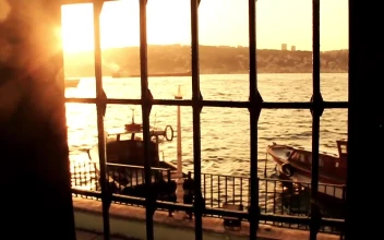 Stock Video Boats Floating On A Shoreline Seen From A Window For PC