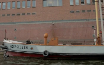 Stock Video Boats Docked Along A River In Hamburg For PC