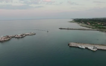 Stock Video Boats Anchored In A Tiny Harbor For PC