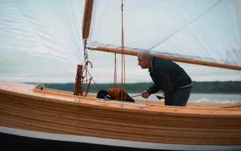 Stock Video Boaters Repairing A Wooden Sailboat For PC