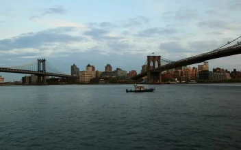 Stock Video Boat Under The Brooklyn Bridge For PC
