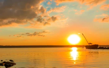 Stock Video Boat Silhouette On The Riverside For PC