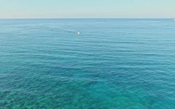 Stock Video Boat Sailing Through The Turquoise Waters For PC