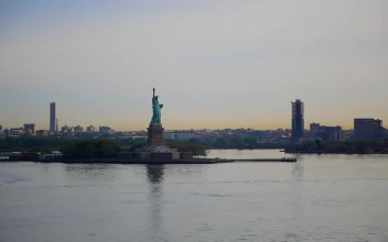Stock Video Boat Sailing Past The Statue Of Liberty For PC