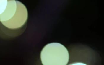 Stock Video Blurred Round White Lights Bokeh Effect For PC