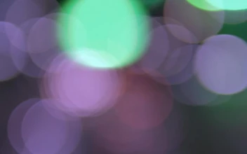 Stock Video Blurred Green And Purple Lights Bokeh For PC