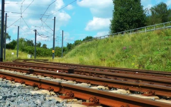 Stock Video Blue Train Passing On Railways For PC