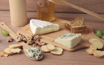Stock Video Blue Cheese On A Wooden Board For PC
