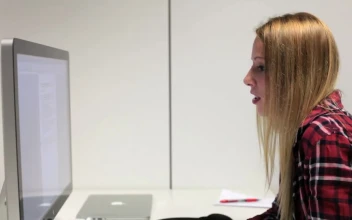 Stock Video Blonde Woman In Front Of A Computer For PC