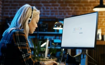 Stock Video Blonde Girl Surfing The Internet At The Office For PC