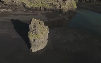 Stock Video Black Sand Beach Rock Formation For PC