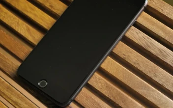 Stock Video Black Cellphone On A Wooden Table For PC