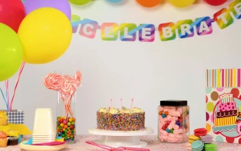 Stock Video Birthday Party Table With Balloons Falling For PC