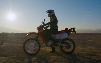 Stock Video Biker Starting His Motorcycle In The Desert For PC
