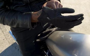Stock Video Biker Putting On Riding Gloves For PC