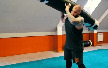 Stock Video Big Man Doing Heavy Exercise In A Gym For PC