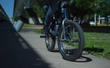 Stock Video Bicycle Being Used On The Sidewalk For PC