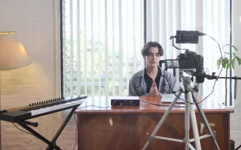 Stock Video Behind The Scenes Of A Young Man Recording A Video For PC