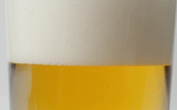 Stock Video Beer Settling In A Glass For PC