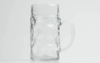 Stock Video Beer Pouring In Slow Motion Into A Mug Beer For PC