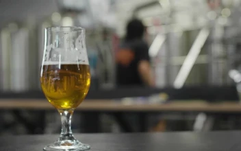 Stock Video Beer Glass With Factory In The Background For PC