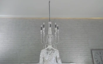 Stock Video Beautiful Wedding Dress Hanging In A White Room For PC