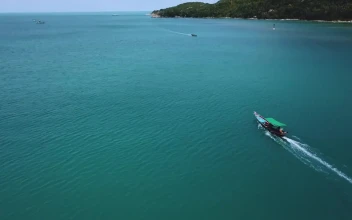 Stock Video Beautiful Peninsula With Boats In The Water Seen From Above For PC