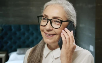 Stock Video Beautiful Elderly Woman Chats On Mobile Phone For PC