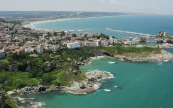 Stock Video Beautiful Coastal Region With Houses Along The Top For PC
