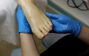 Stock Video Beautician Applying Lotion During A Spa Session For PC