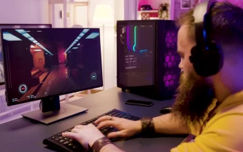 Stock Video Bearded Man Online Gaming In Home Office For PC