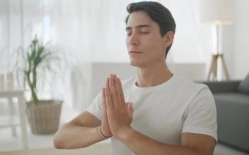 Video Stock Closeup Of Man In Namaste Yoga Pose In Living Room For PC