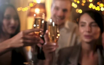 Video Stock Closeup Of Friends Toast With Champagne And Holiday Lights For PC