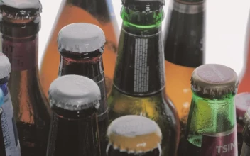 Video Stock Closed Beer Glass Bottles On A White Background For PC