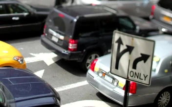 Video Stock Close Up Shot Of Highway Traffic Near A Sign For PC